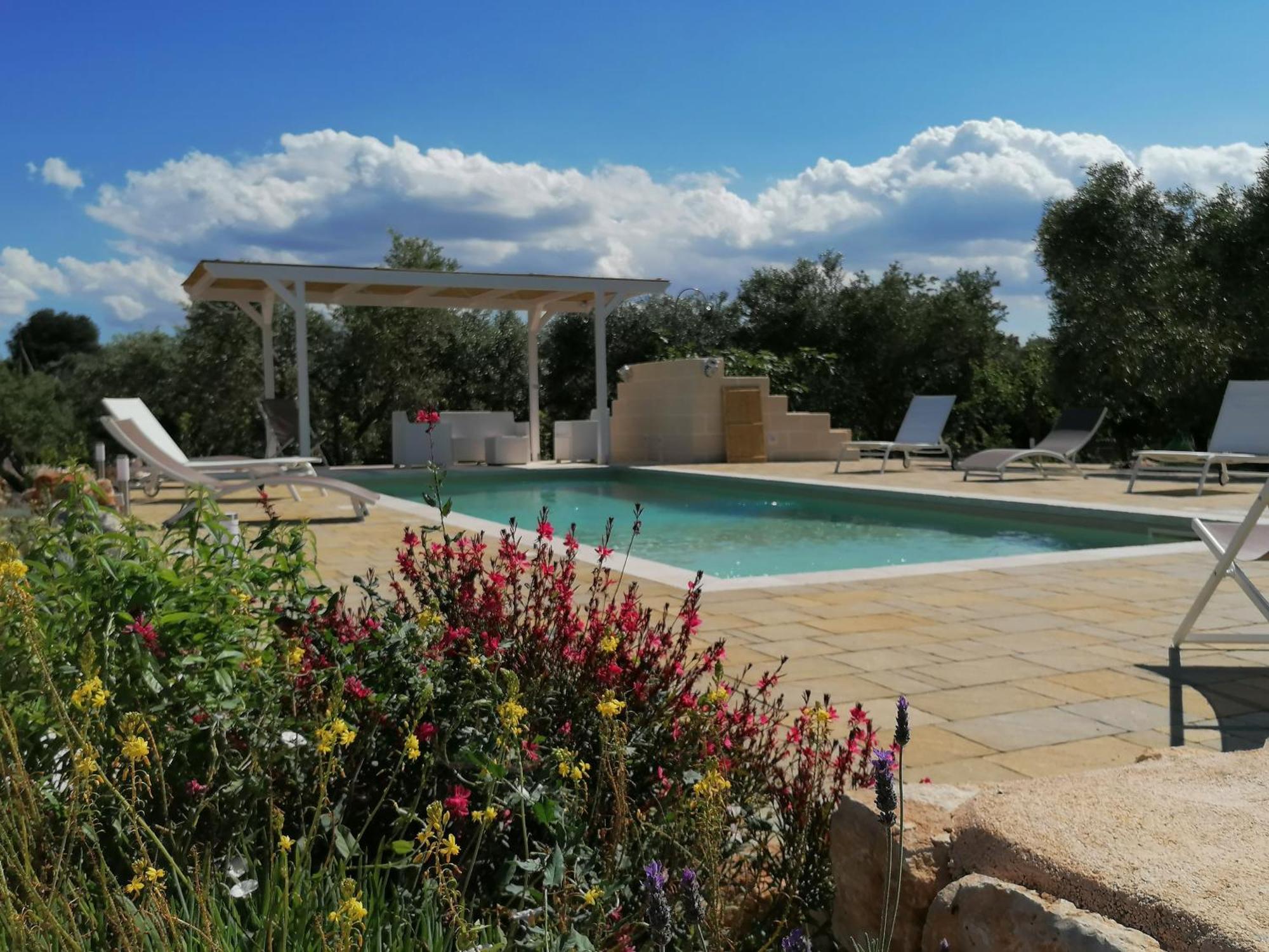 Гостевой дом Trullo Del Sol Челье-Мессапика Экстерьер фото